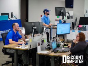 oklahoma city discount dumpster employees in the office