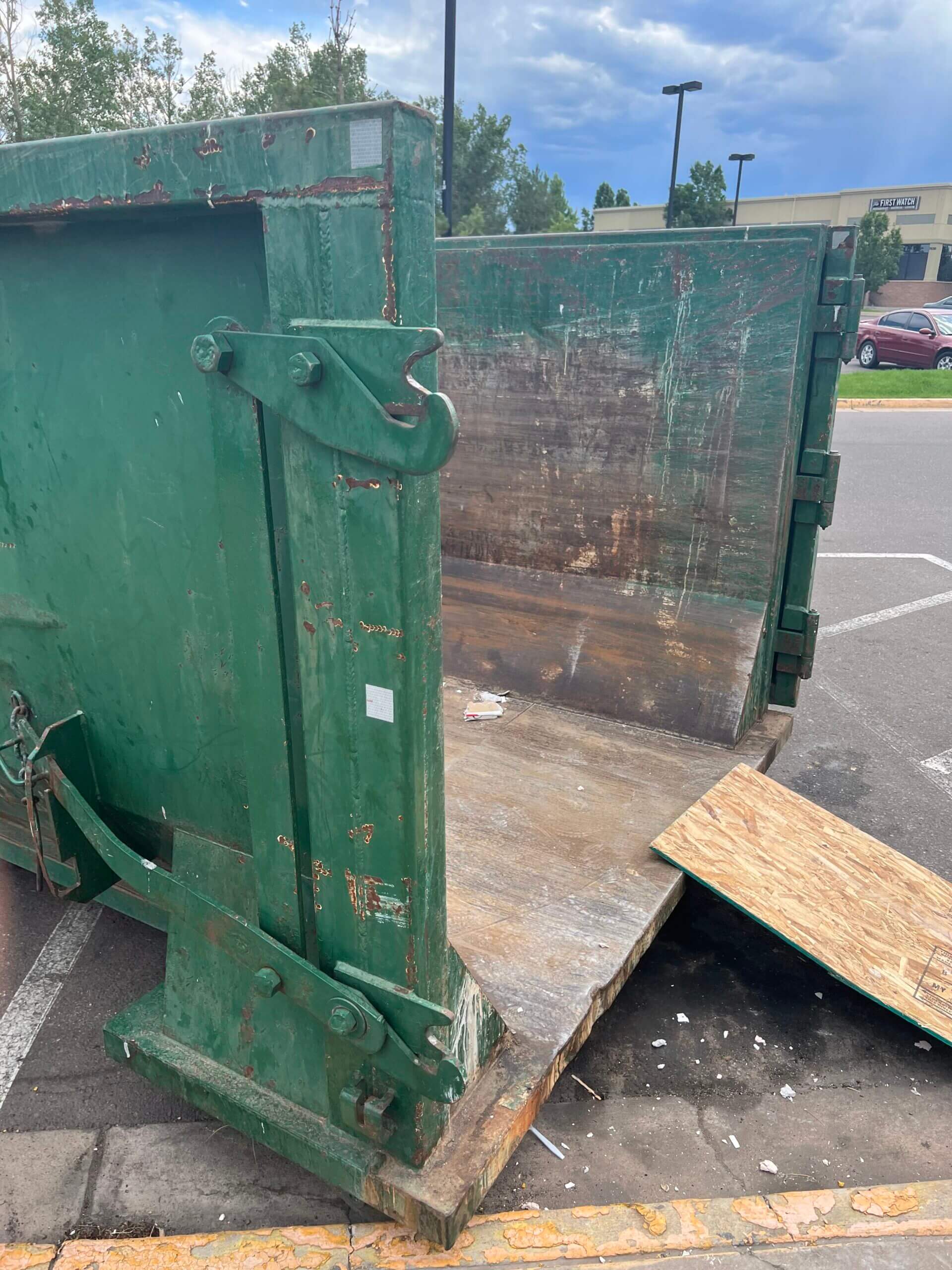 Photo of a green dumpster rental in Albuquerque, NM
