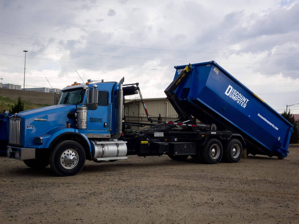 A photo of a 10 yard dumpster rental in Denver being dropped off