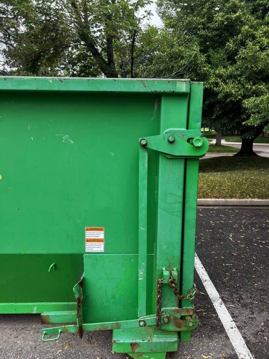 Photo of a green dumpster rental in Cheyenne, WY