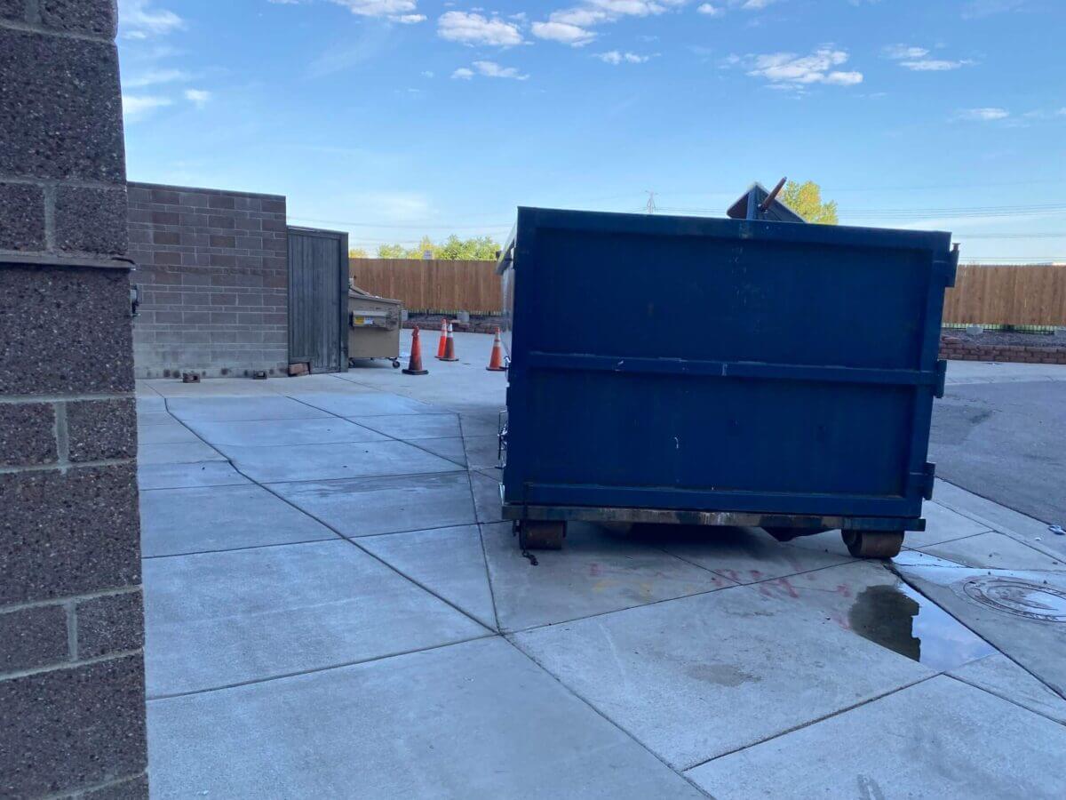 Photo of a blue dumpster rental in Salt Lake City, UT