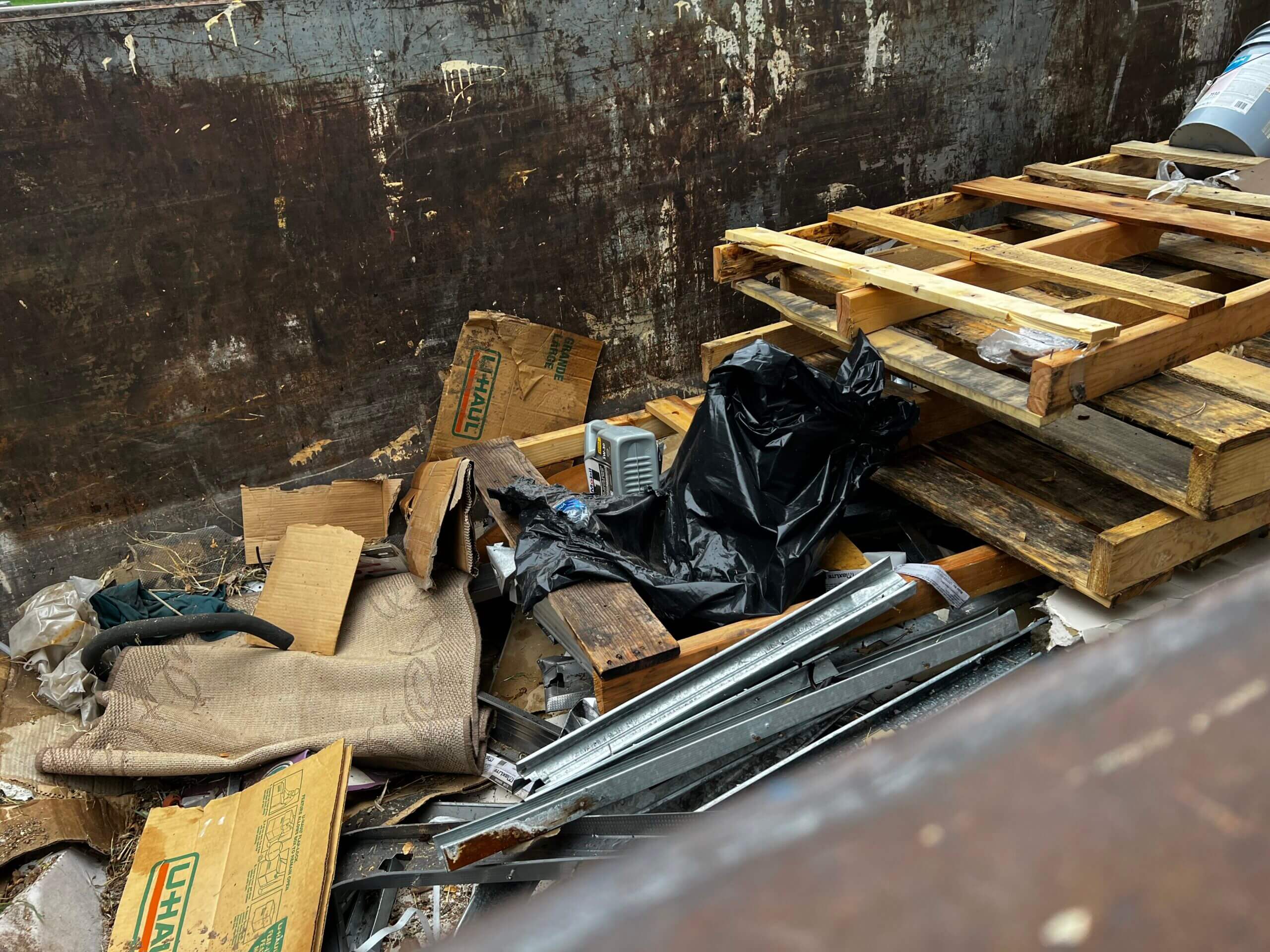Photo of a dumpster rental in Henderson, NV, filled with wood scraps