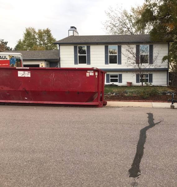 A photo of a red dumpster rental in Norfolk, VA