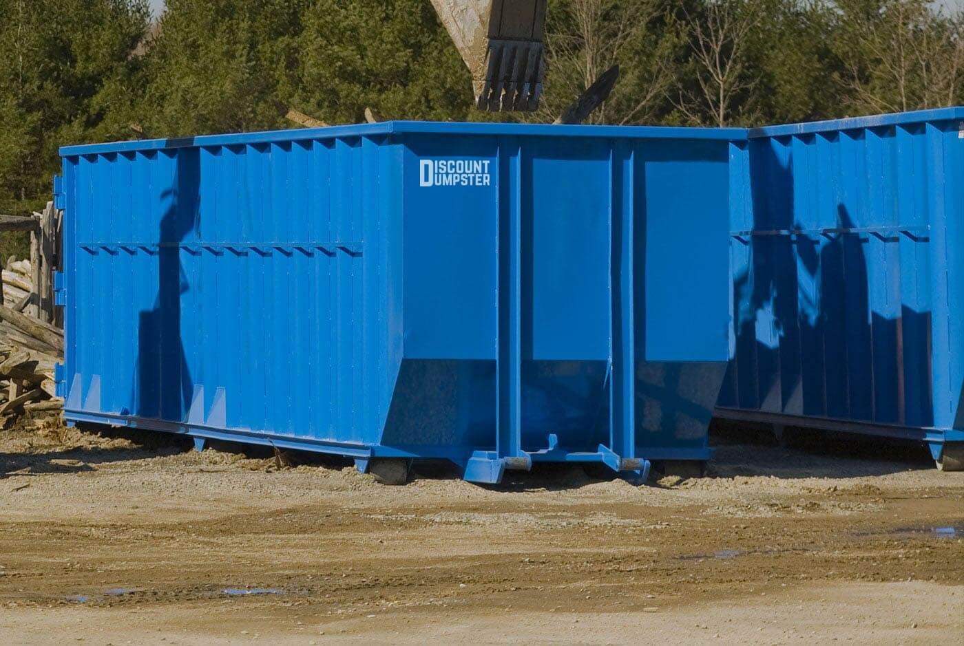 Photo of a blue dumpster rental in San Antonio, TX